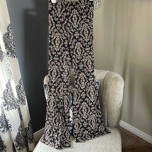 Black tan print flare pants small